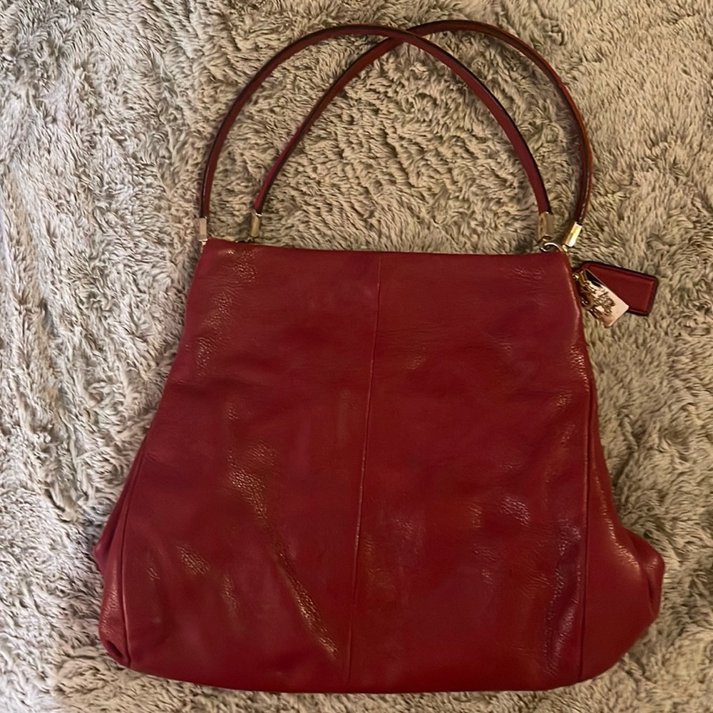 Red leather coach bag. Great used condition.